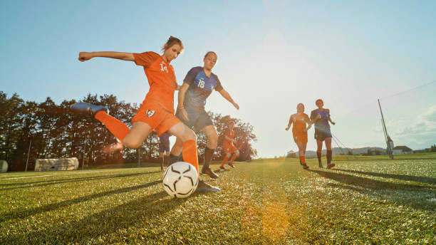 istock Female player kicking ball 1434372358