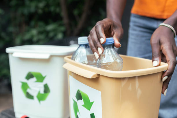 istock Unrecognizable woman recycling plastic waste at home 1434375670