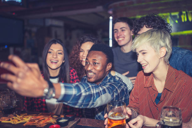 istock Friends taking a selfie in the pub 1434380184