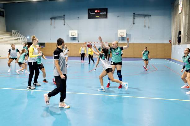 istock Women's handball team doing skill exercises in training 1434381112