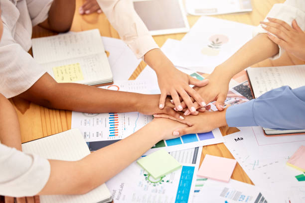istock Teamwork, women collaboration or hands in support, trust or motivation for brand strategy business meeting. Diversity vision or innovation planning with target audience kpi research infographic paper 1434382089