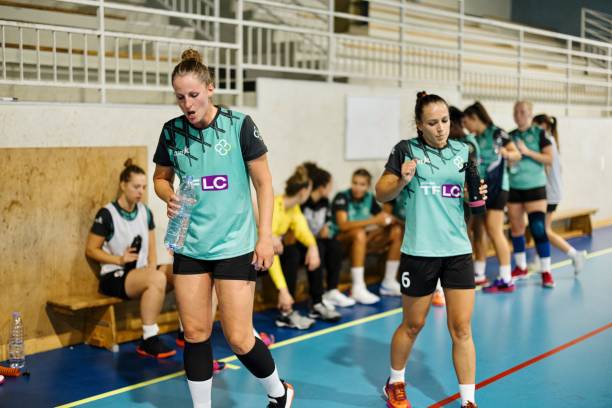 istock Tired Female players drinking water during training 1434382138
