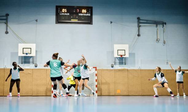 istock Female players perform an attacking practice during handball training 1434383552