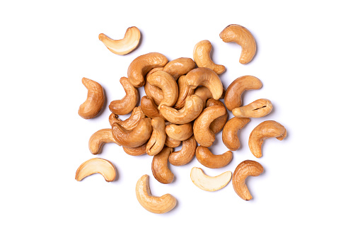 Group of roasted cashew nut isolated on white background. Top view. Flat lay.