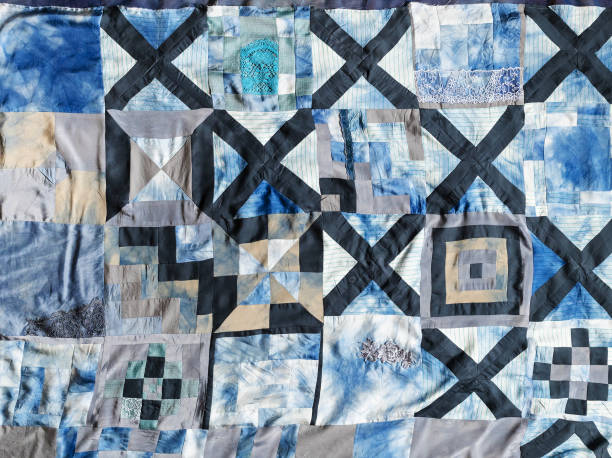istock surface of hand-sewn silk patchwork quilt 1434387394