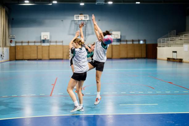 istock Female players perform an attacking practice during handball training 1434387424