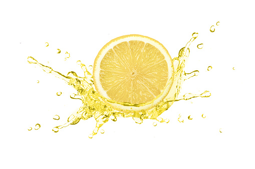 Lemon juice splash with fresh limon fruit isolated on white background.