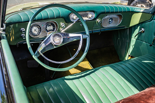 Falcon Heights, MN - June 19, 2022: High perspective detail interior view of a 1960 Studebaker Lark VIII Regal Convertible at a local car show.