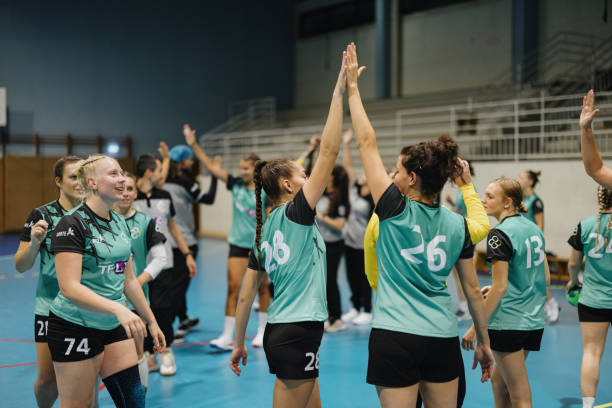 istock High five between women's handball teammates 1434391353