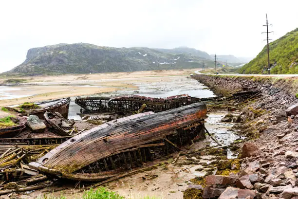 Photo of Ship cemetery on the coast of the Barents Sea in Teriberka .