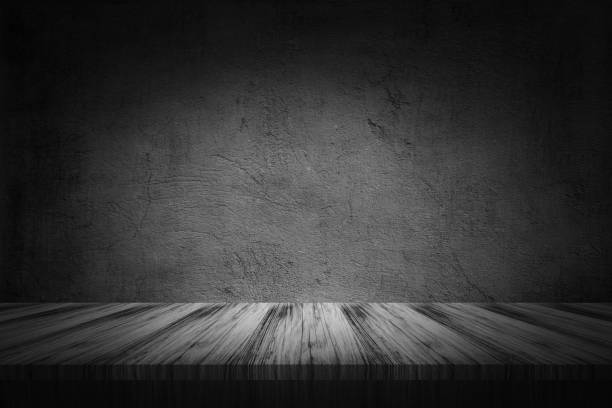 istock 3D wooden table looking out to a grunge wall 1434393958