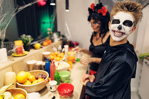 Mother and son enjoying snacks on Halloween Party.
Shot with Canon R5