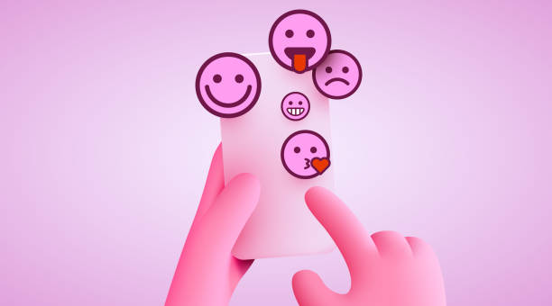 istock Hand holding phone emoticons. Social media and messenger chatting. 1434395513