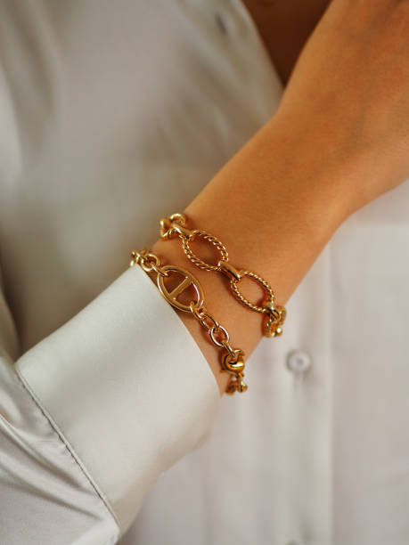 istock Gold bracelet on a woman wrist 1434399216