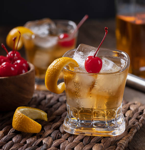 istock Old fashioned cocktail with orange peel and cherry 1434404370