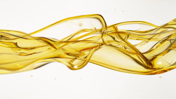 istock Flowing Oil on White Background 1434406055