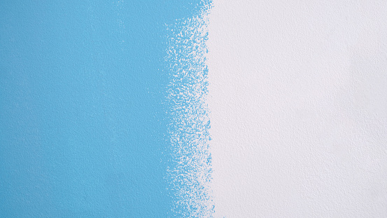 Home renovation and wall painting white and blue. Texture background wall concept