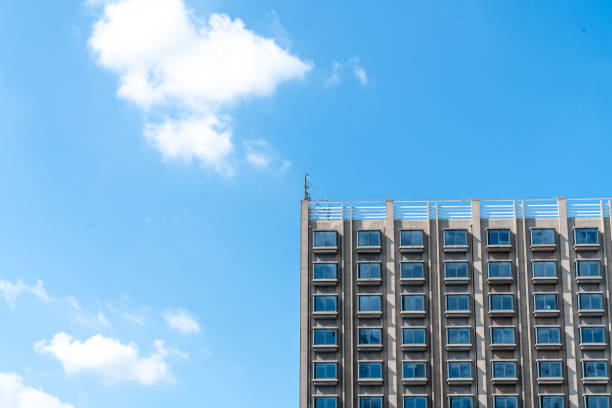 Free Stock Photo of Tall Building Top With Blue Sky Background ...