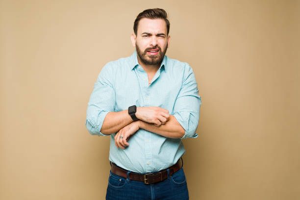 istock Caucasian man making eye contact suffering from skin allergy 1434409976