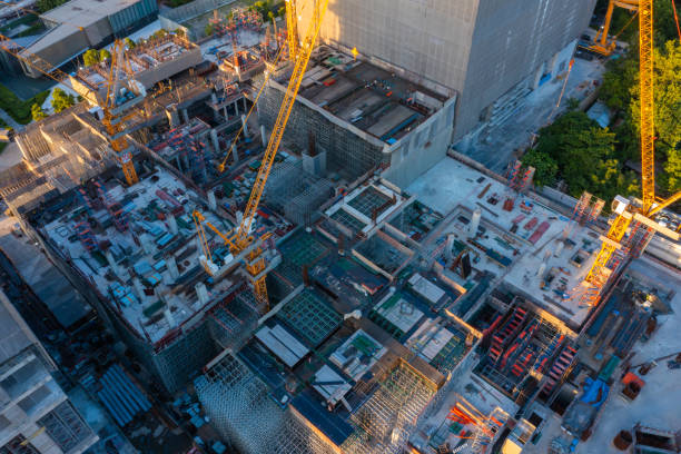 aerial view of construction site with tower crane urban construction rush hour of concrete pouring - foundation claude monet imagens e fotografias de stock