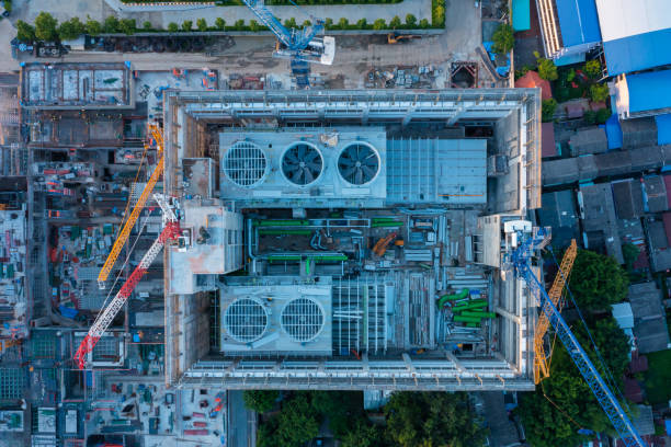 aerial view of construction site with tower crane urban construction rush hour of concrete pouring - foundation claude monet imagens e fotografias de stock