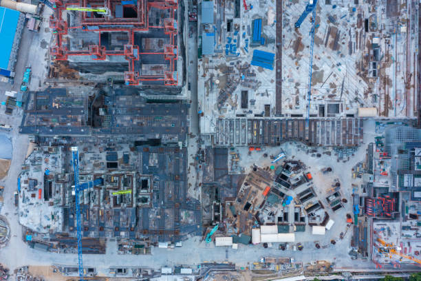 aerial view of construction site with tower crane urban construction rush hour of concrete pouring - foundation claude monet imagens e fotografias de stock