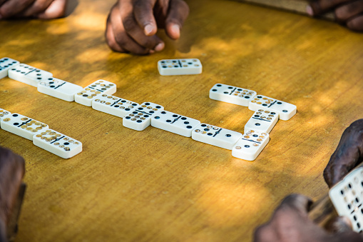 A game of dominoes are easy.  Just match the numbers and try to end with multiples of 5's.