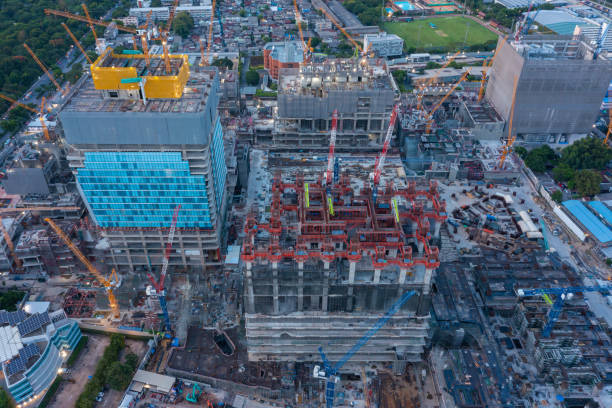 aerial view of construction site with tower crane urban construction rush hour of concrete pouring - foundation claude monet imagens e fotografias de stock