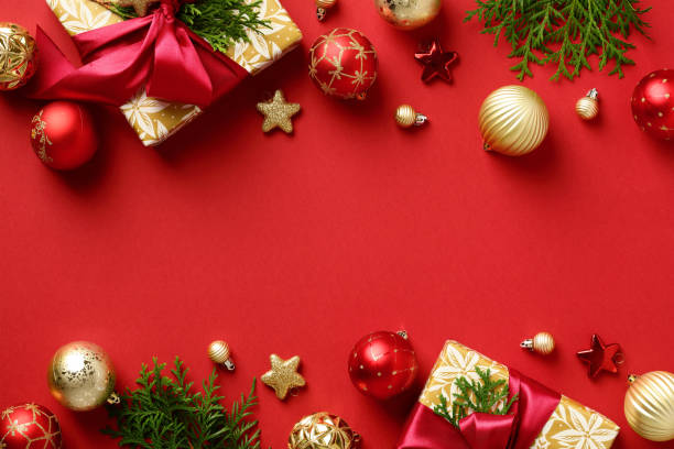 istock Red Christmas background with gift boxes, for branches, red and gold baubles. Christmas frame. Xmas greeting card, poster, cover template. 1434419535