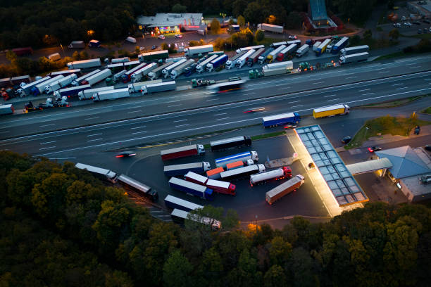 istock Highway and rest area at dusk - aerial view 1434423366