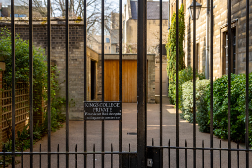 Kings College entrance gate in the historic university town of Cambridge, England, UK.