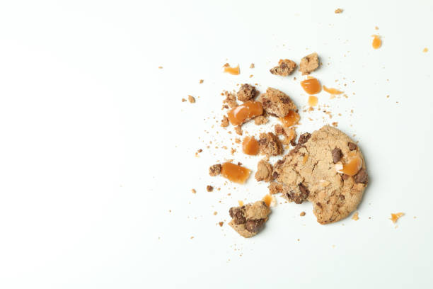 istock Tasty cookie with caramel on white background 1434426182