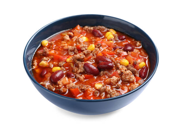 Bowl with tasty chili con carne on white background Bowl with tasty chili con carne on white background chilli stock pictures, royalty-free photos & images