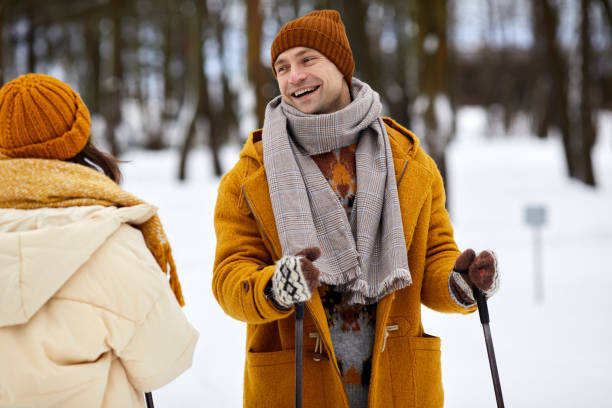 istock Happy Couple Skiing in Forest 1434428886