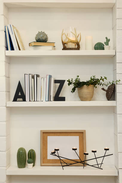 istock Many shelves with different decor in room. Interior design 1434431799