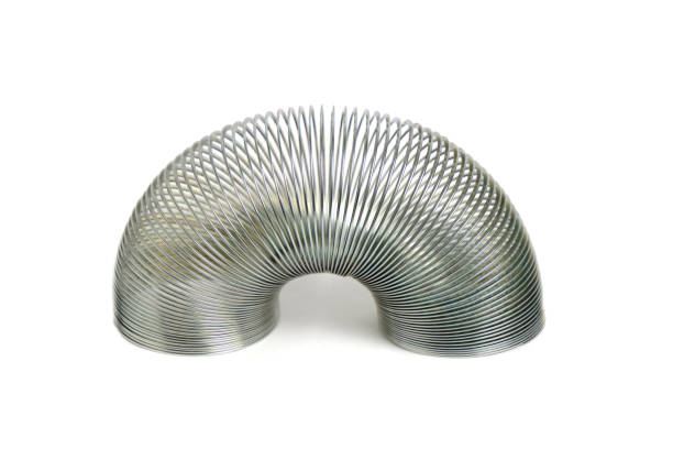 istock Metal toy antistress spring slinky, on white background. 1434433877