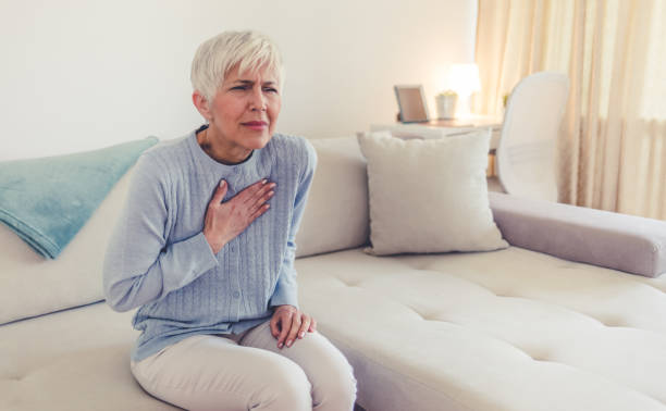 istock Woman suffering from chest pain. 1434434860