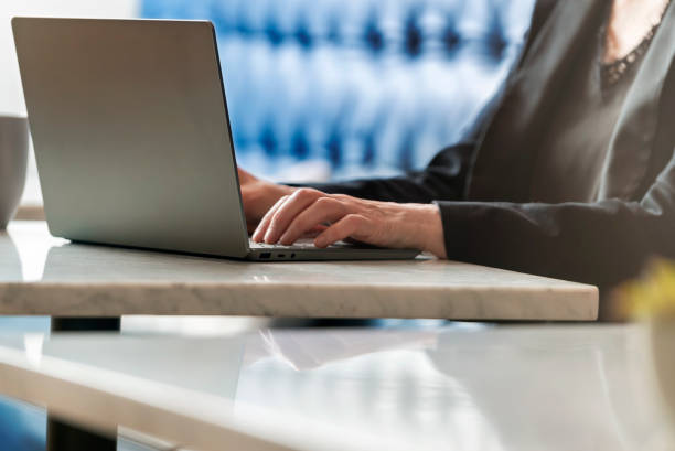 istock Remote Working On Laptop Computer at Cafe or Coffee Shop 1434437498
