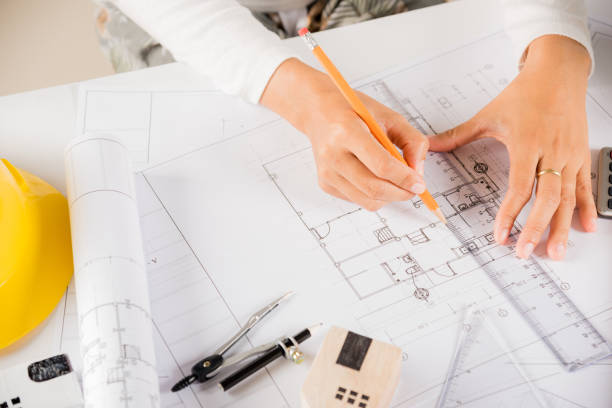 istock Top view of architect drawing with ruler on house plan blueprint paper for repair tools 1434437695