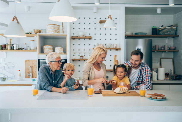 istock Happy family having breakfast. 1434437966