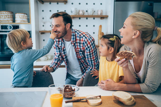 istock Happy family having breakfast. 1434437969