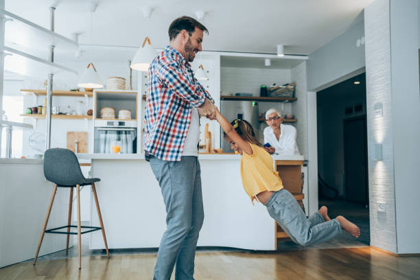 istock Happy young dad playing with his daughter. 1434437972