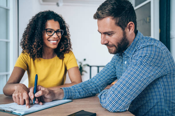 istock Business people signing a contract. 1434438026