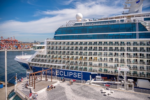 Vancouver, Canada – July 24, 2022: Vancouver, British Columbia - July 24, 2022: Cruise ship Celebrity Eclipse docked at Canada Place in the Port of Vancouver during cruise ship season.