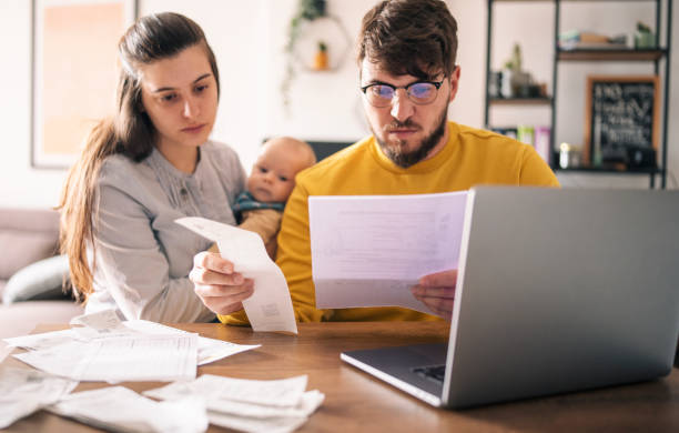 istock Family calculating their monthly expenses. 1434444152