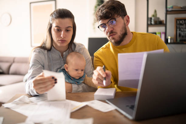 istock Family calculating their monthly expenses. 1434444164