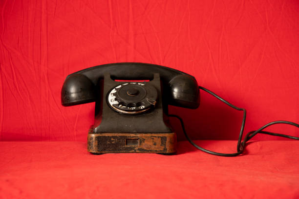 istock Old black retro phone on isolated background , rotary phone 1434445867