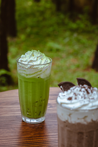 Matcha, Chocolate, Cookies Ice Blended Drinking Glass High Resolution Stock Photo