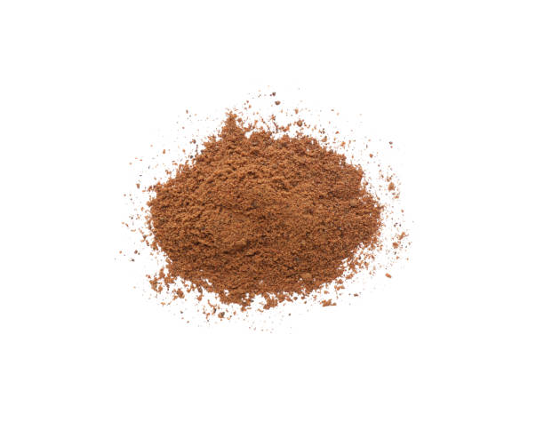 istock Heap of nutmeg powder on white background, top view 1434446504