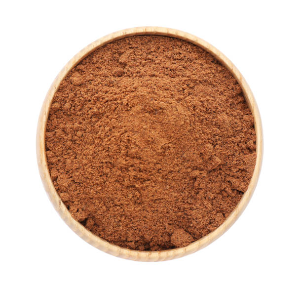 istock Bowl with nutmeg powder on white background, top view 1434446800